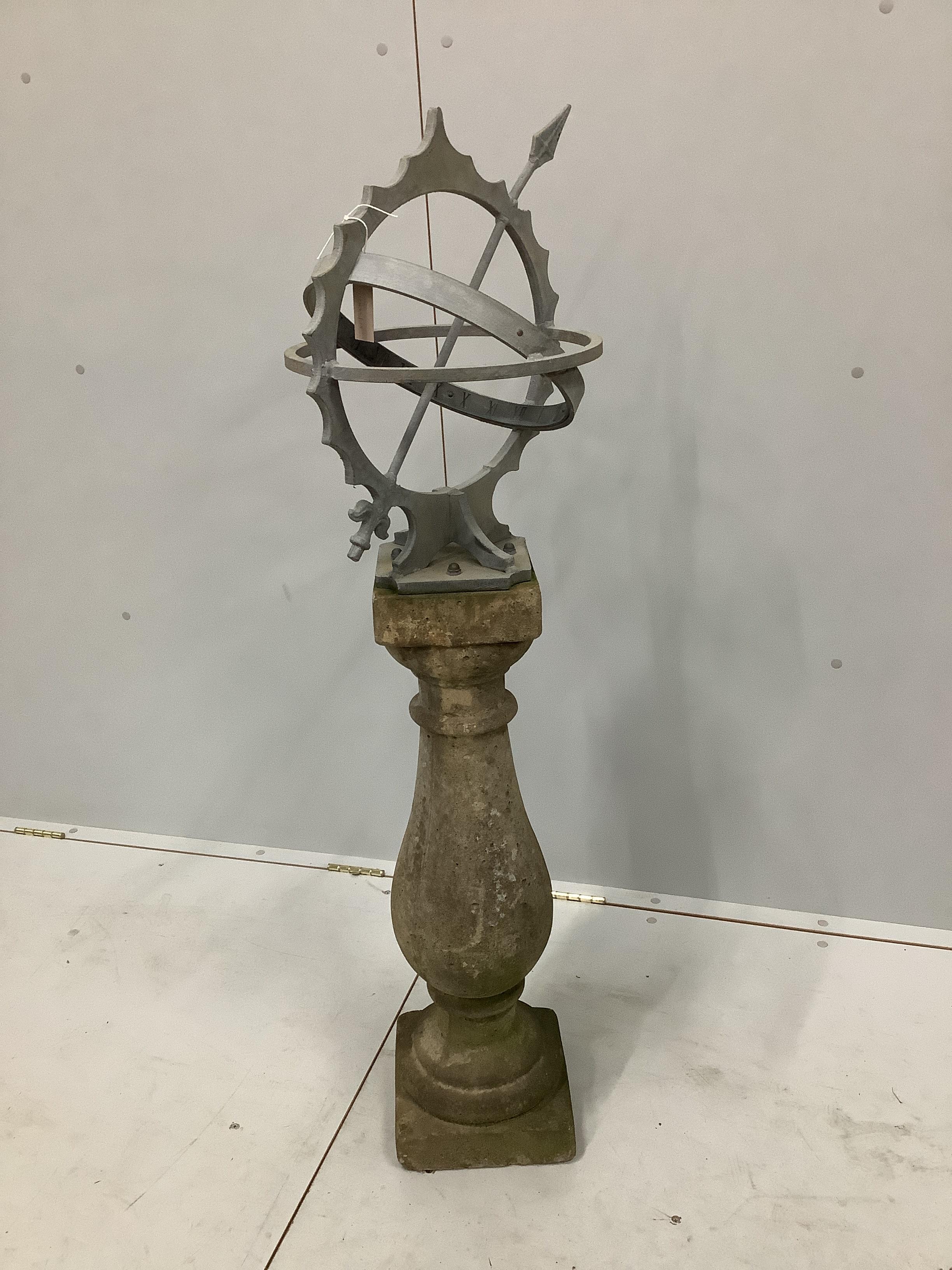 A cast metal sun dial on reconstituted stone baluster column, height 124cm
